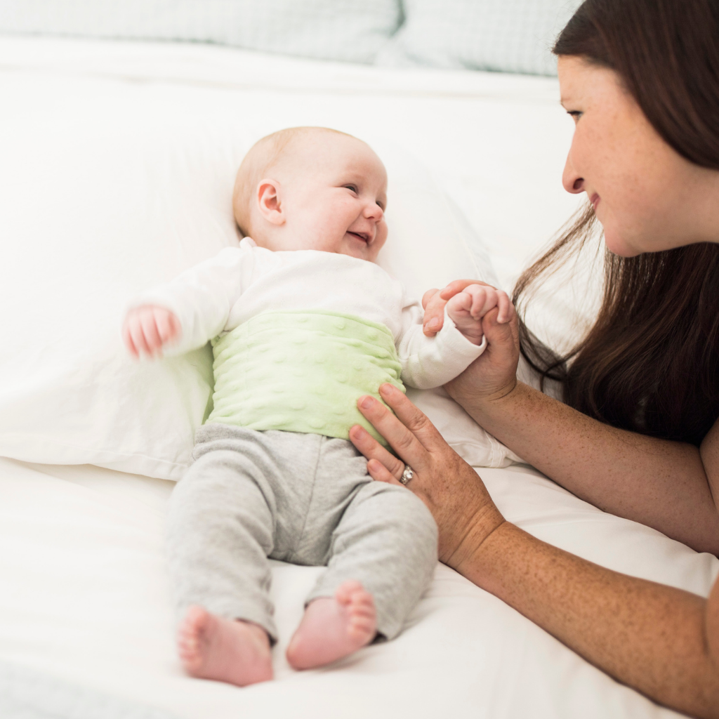 Calm Your Fussy Baby Instantly With This Happi Tummi Honeydew Green Plush Waistband and Herbal Pouch